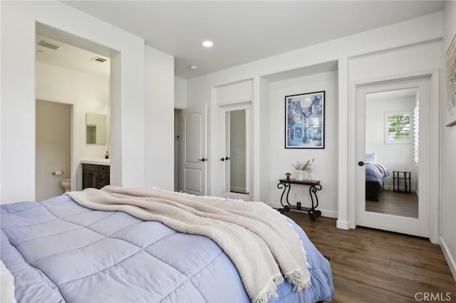 8519 E Kendra Loop, Orange, CA 92867 - bedroom featuring dark wood-style floors, connected bathroom, recessed lighting, and baseboards