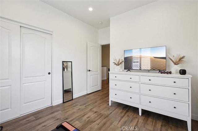 8519 E Kendra Loop, Orange, CA 92867 - bedroom with wood finished floors, a closet, baseboards, and recessed lighting