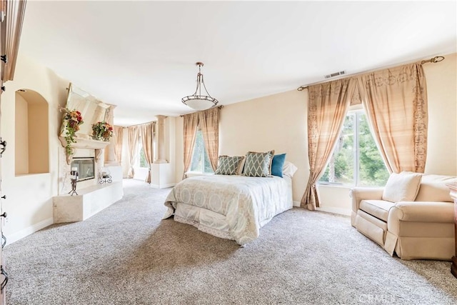 45975 Sandia Creek Dr, Temecula, CA 92590 - bedroom featuring carpet floors, baseboards, and a glass covered fireplace