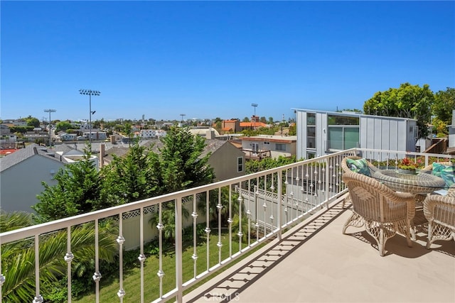 balcony featuring a residential view