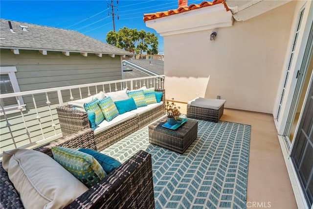 view of patio / terrace featuring outdoor lounge area and a balcony