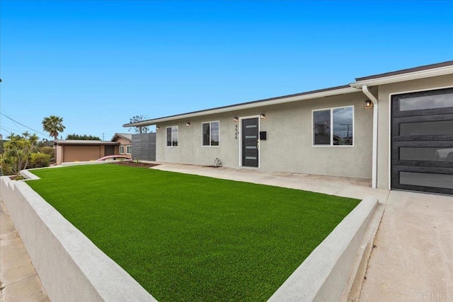 4566 Derrick Dr, San Diego, CA 92117 - rear view of property with stucco siding and a patio