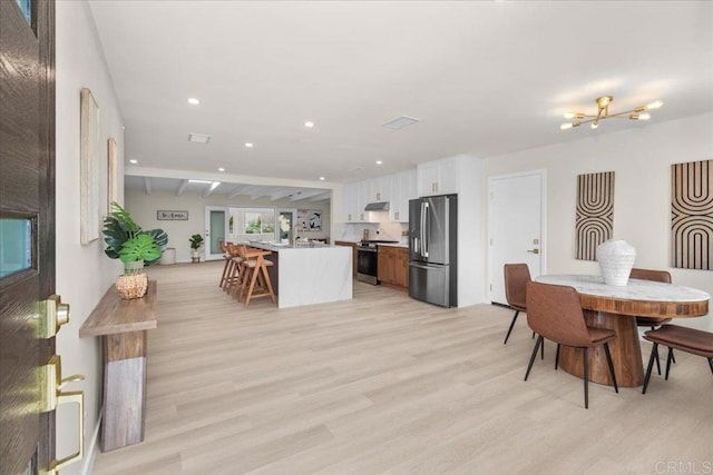 4566 Derrick Dr, San Diego, CA 92117 - dining room with light wood-style floors and recessed lighting