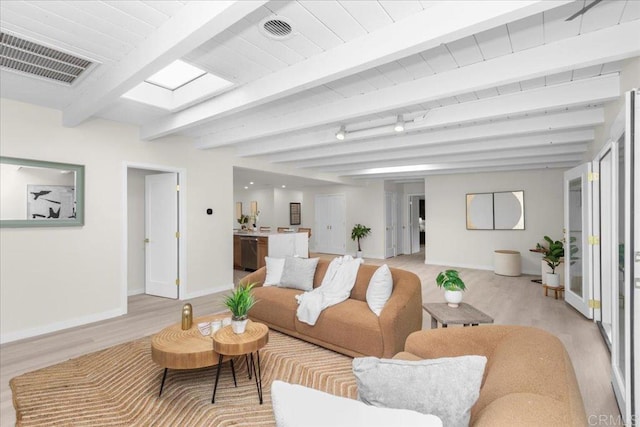 4566 Derrick Dr, San Diego, CA 92117 - living room featuring baseboards, light wood-style floors, and beamed ceiling