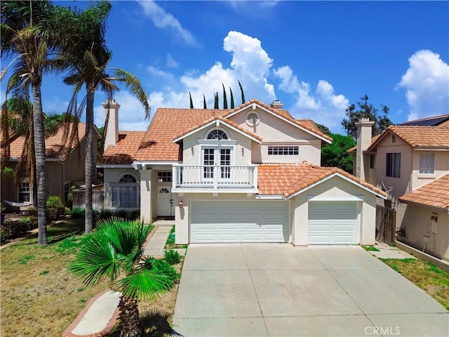 24062 Fuschia Ct, Murrieta, CA 92562 - mediterranean / spanish house with a balcony, stucco siding, a tiled roof, driveway, and a garage