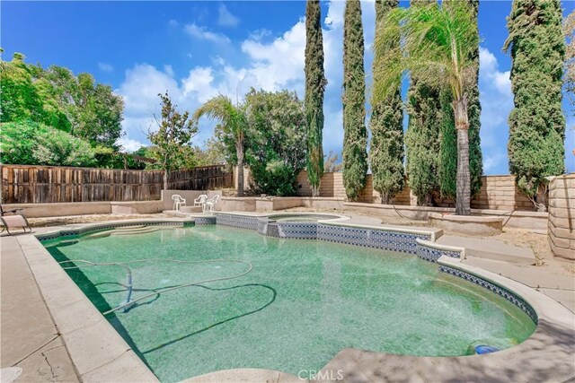 24062 Fuschia Ct, Murrieta, CA 92562 - view of swimming pool with an in-ground hot tub, a fenced backyard, and a patio area