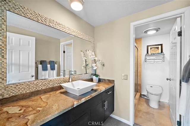 994 Bayside Cv, Newport Beach, CA 92660 - full bath with toilet, vanity, a shower stall, baseboards, and tasteful backsplash