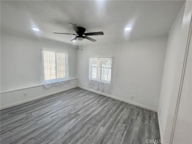 128130 E 1st St, Buttonwillow, CA 93206 - unfurnished room featuring wood finished floors, ceiling fan, a textured ceiling, baseboards, and ornamental molding