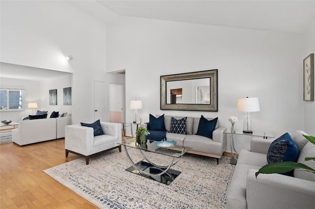 566 Elkhorn Dr, Duarte, CA 91010 - living room featuring light wood-style flooring and high vaulted ceiling