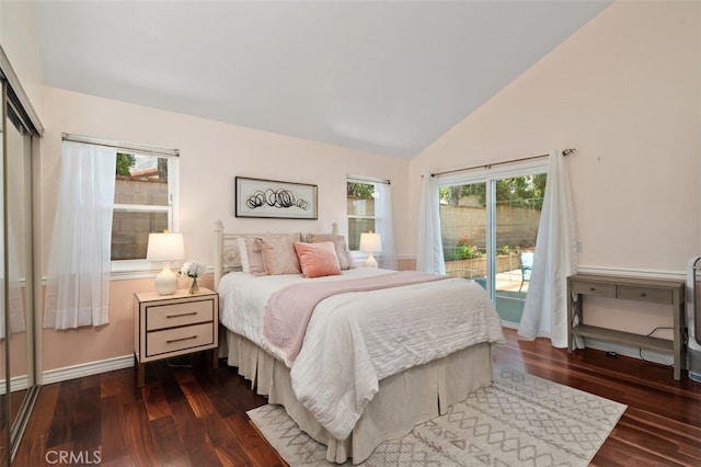 566 Elkhorn Dr, Duarte, CA 91010 - bedroom with access to exterior, dark wood-style floors, multiple windows, baseboards, and high vaulted ceiling