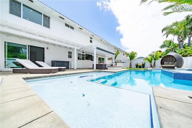 20191 Imperial Cove Ln, Huntington Beach, CA 92646 - view of pool featuring a pergola, an outdoor hangout area, a pool with connected hot tub, and a patio