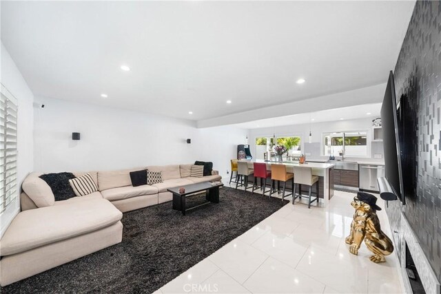 20191 Imperial Cove Ln, Huntington Beach, CA 92646 - tiled living area with recessed lighting and a sink