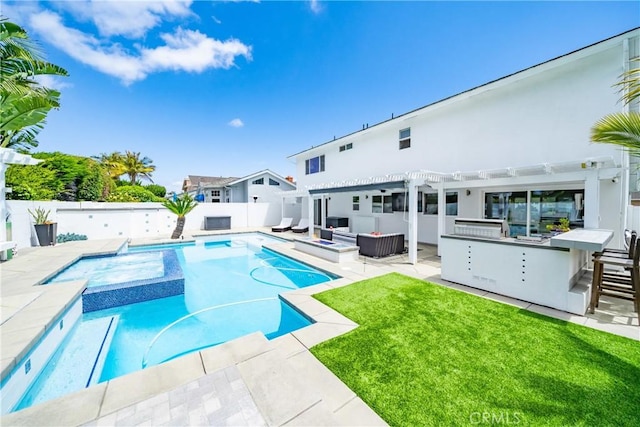 20191 Imperial Cove Ln, Huntington Beach, CA 92646 - view of swimming pool with exterior bar, a pergola, a pool with connected hot tub, outdoor lounge area, and a patio
