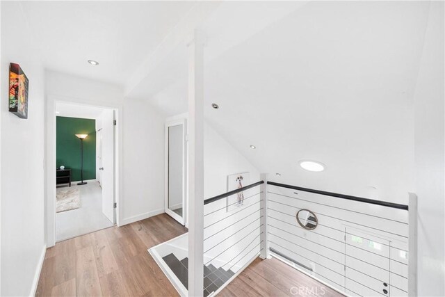 20191 Imperial Cove Ln, Huntington Beach, CA 92646 - stairs with wood finished floors, lofted ceiling, and recessed lighting