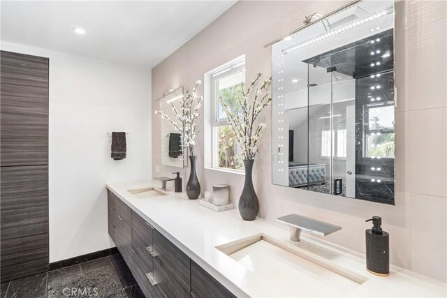 20191 Imperial Cove Ln, Huntington Beach, CA 92646 - full bath with double vanity, baseboards, granite floors, and ensuite bathroom