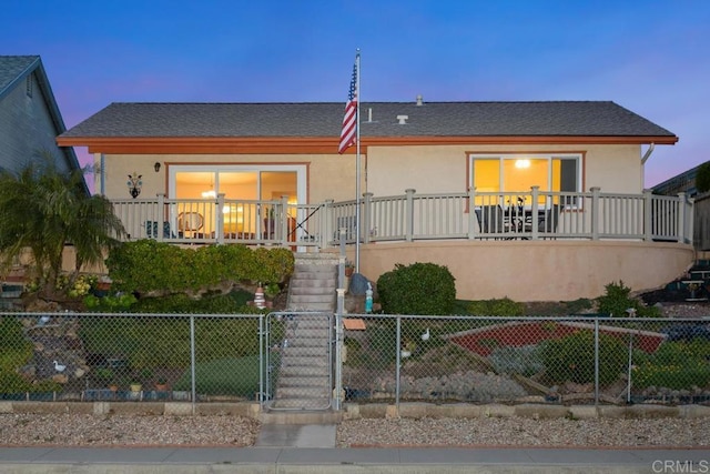 634 Via, Santa Paulo, Vista, CA 92081 - view of front of property with a fenced front yard, stairway, stucco siding, a gate, and a shingled roof