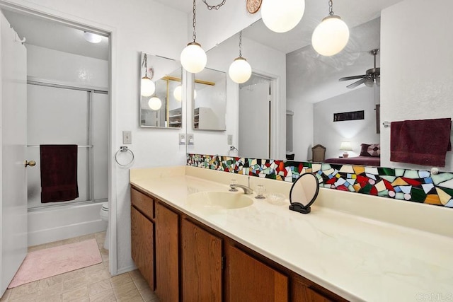 634 Via, Santa Paulo, Vista, CA 92081 - bathroom featuring a ceiling fan, vanity, toilet, shower / bath combination with glass door, and lofted ceiling