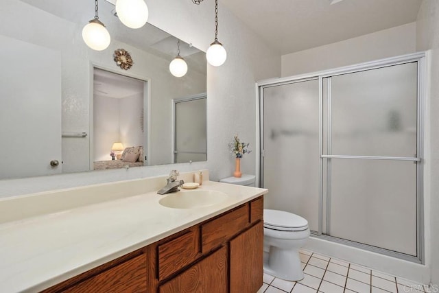634 Via, Santa Paulo, Vista, CA 92081 - bathroom featuring tile patterned flooring, a stall shower, toilet, and vanity