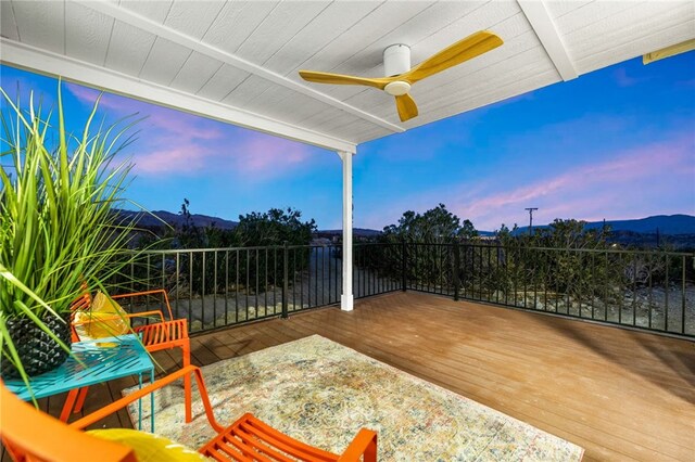 21408 Apollo Way, Desert Hot Springs, CA 92241 - view of patio / terrace with a ceiling fan and a mountain view