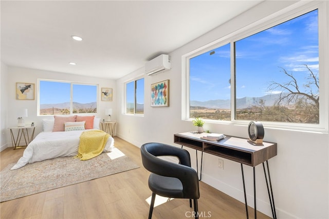 21408 Apollo Way, Desert Hot Springs, CA 92241 - bedroom featuring a wall mounted air conditioner, a mountain view, wood finished floors, recessed lighting, and baseboards
