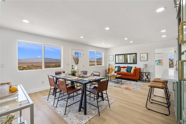21408 Apollo Way, Desert Hot Springs, CA 92241 - dining area featuring light wood-style flooring, recessed lighting, and baseboards