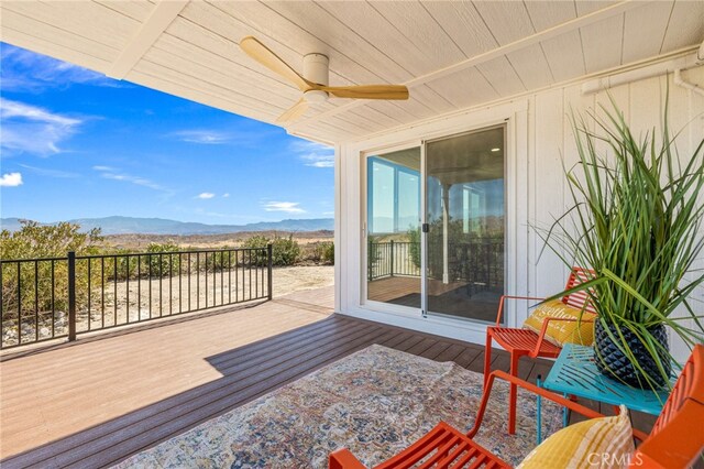 21408 Apollo Way, Desert Hot Springs, CA 92241 - deck with a mountain view and ceiling fan
