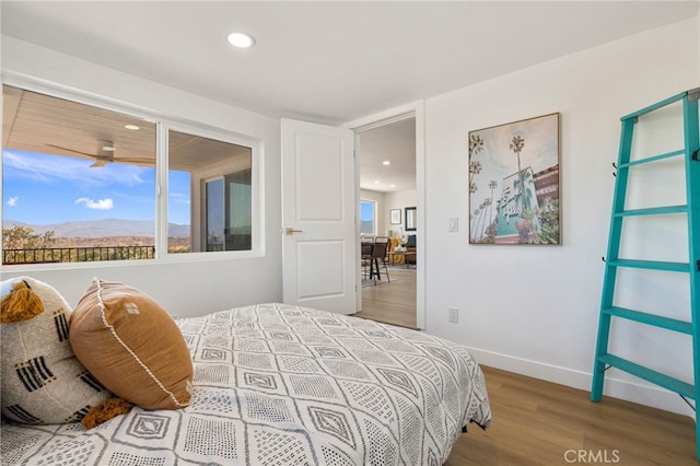 21408 Apollo Way, Desert Hot Springs, CA 92241 - bedroom featuring wood finished floors, recessed lighting, and baseboards