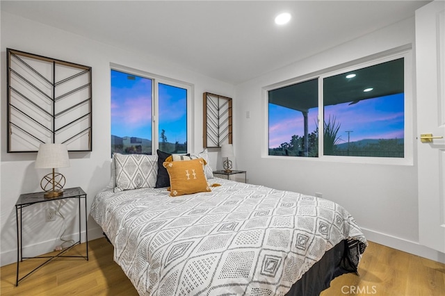 21408 Apollo Way, Desert Hot Springs, CA 92241 - bedroom featuring wood finished floors, recessed lighting, and baseboards