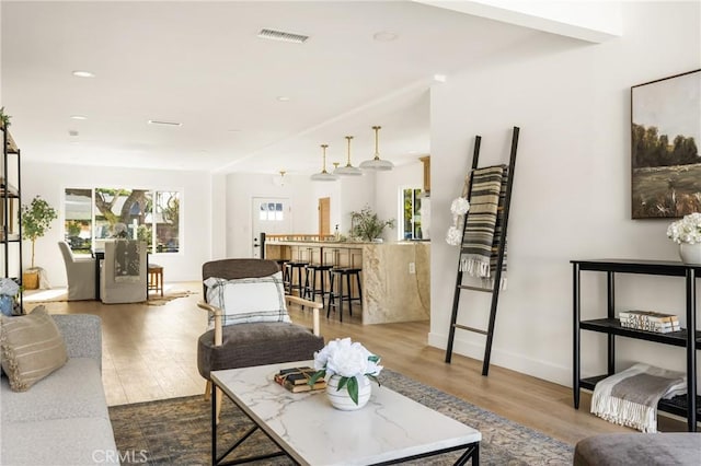 1909 Montair Ave, Long Beach, CA 90815 - living area with wood finished floors and recessed lighting