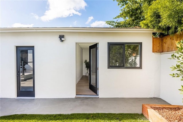 1909 Montair Ave, Long Beach, CA 90815 - doorway to property with stucco siding and fence