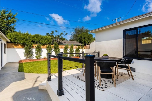 1909 Montair Ave, Long Beach, CA 90815 - wooden deck with outdoor dining space