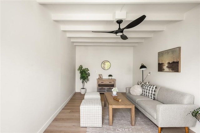 1909 Montair Ave, Long Beach, CA 90815 - living room featuring a ceiling fan, beam ceiling, light wood-style flooring, and baseboards