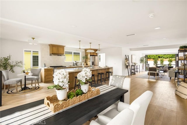 1909 Montair Ave, Long Beach, CA 90815 - dining area with light wood-type flooring and recessed lighting