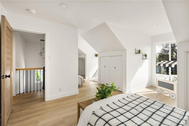 1909 Montair Ave, Long Beach, CA 90815 - bedroom with light wood-style floors, baseboards, and a closet