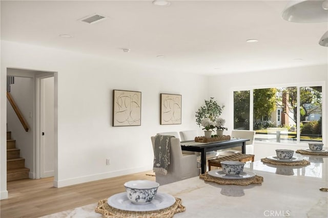 1909 Montair Ave, Long Beach, CA 90815 - dining room featuring stairway, light wood finished floors, baseboards, and recessed lighting