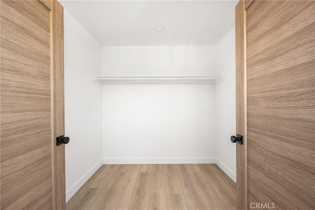 1909 Montair Ave, Long Beach, CA 90815 - spacious closet featuring light wood-type flooring