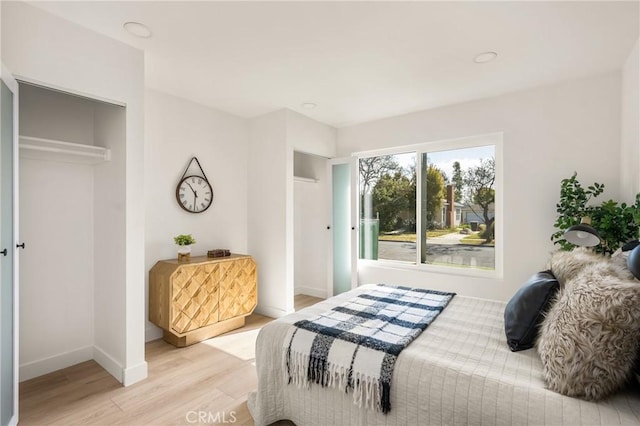 1909 Montair Ave, Long Beach, CA 90815 - bedroom featuring light wood-style flooring and baseboards
