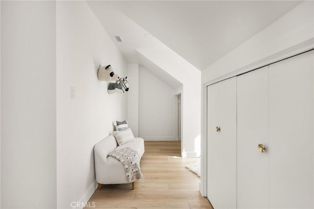 1909 Montair Ave, Long Beach, CA 90815 - living area with light wood-style floors, baseboards, and lofted ceiling