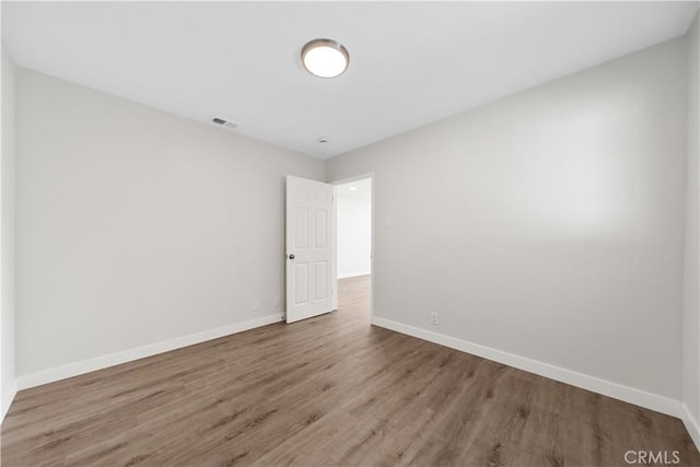 116 N Wildwood Ave, Glendora, CA 91741 - unfurnished room with wood finished floors and baseboards