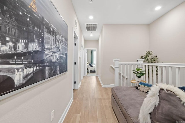 1211 Sunrise Vw Unit 104, San Marcos, CA 92078 - hall with wood finished floors, recessed lighting, an upstairs landing, and baseboards