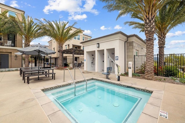 1211 Sunrise Vw Unit 104, San Marcos, CA 92078 - view of swimming pool with fence, a community hot tub, and a patio area