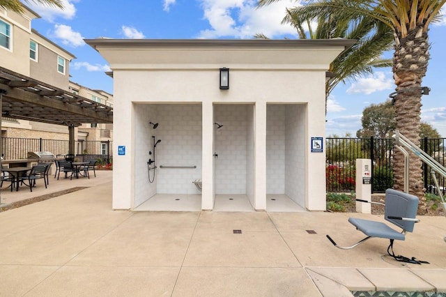 1211 Sunrise Vw Unit 104, San Marcos, CA 92078 - view of community featuring a pergola, fence, and a patio