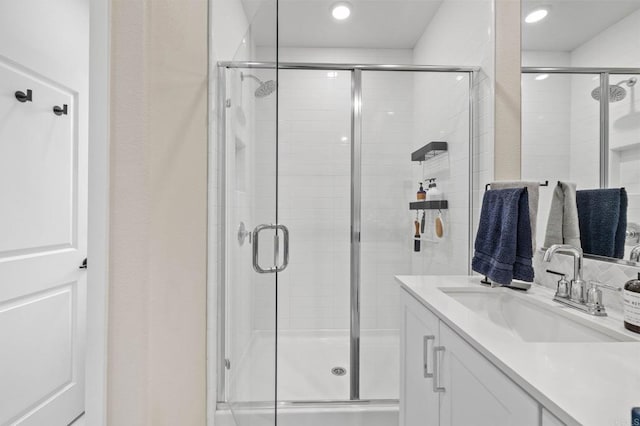 1211 Sunrise Vw Unit 104, San Marcos, CA 92078 - full bathroom featuring a shower stall and vanity