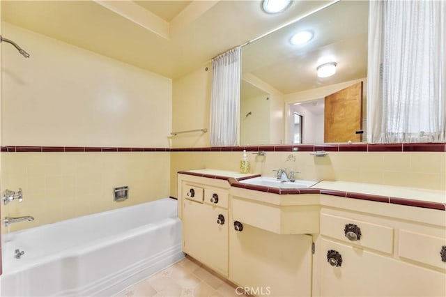 926 E Dalton Ave, Glendora, CA 91741 - bathroom featuring a bathtub, vanity, backsplash, and recessed lighting