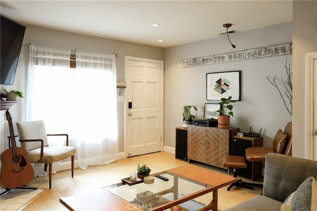 290 Victoria St Unit 19, Costa Mesa, CA 92627 - living area featuring light wood-style flooring and recessed lighting