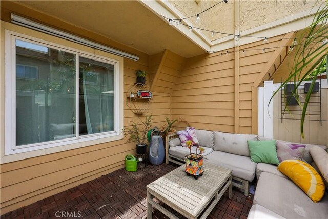 290 Victoria St Unit 19, Costa Mesa, CA 92627 - view of patio featuring an outdoor living space