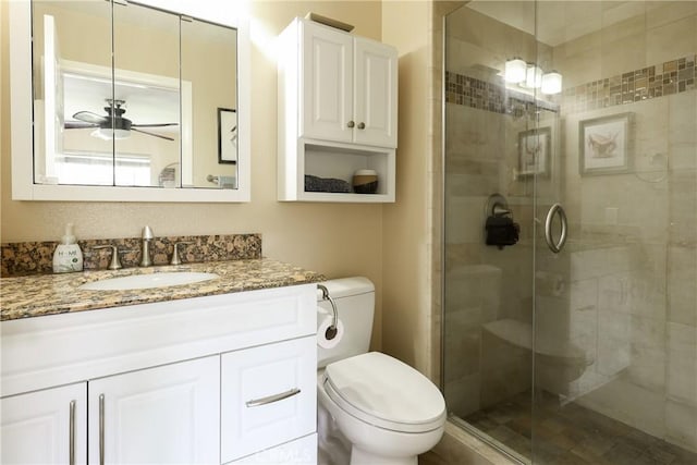 290 Victoria St Unit 19, Costa Mesa, CA 92627 - bathroom featuring a shower stall, toilet, and vanity
