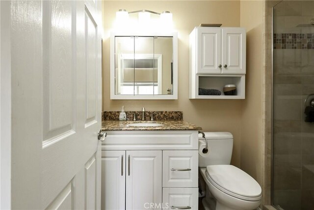 290 Victoria St Unit 19, Costa Mesa, CA 92627 - bathroom with a stall shower, vanity, and toilet
