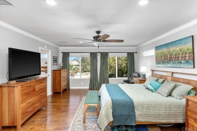bedroom featuring wood finished floors, ornamental molding, recessed lighting, and a ceiling fan