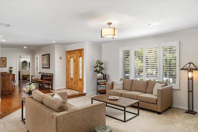 living area featuring baseboards, recessed lighting, crown molding, and light colored carpet